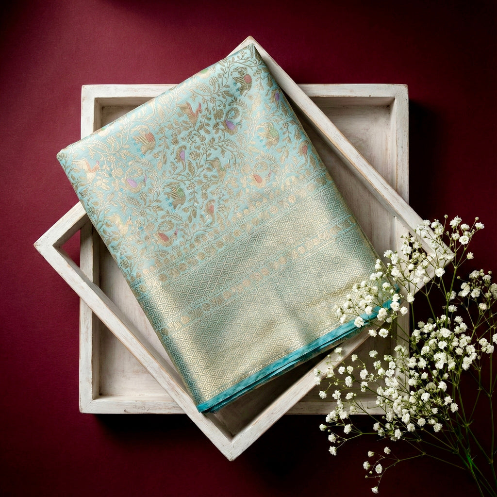 Aqua blue Katan silk Banarasi saree with Shikargah motif from Shades of Ivory Whisper collection